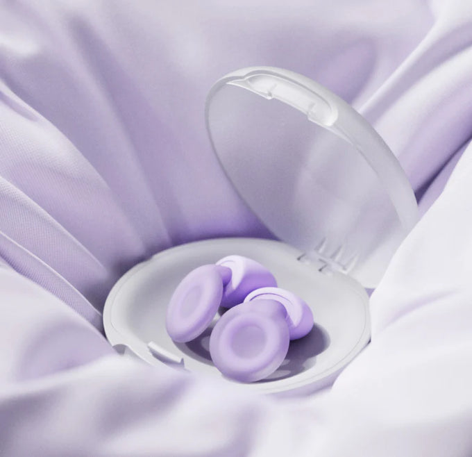 Loop Dream lilac in case on a light purple fabric background